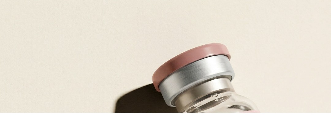 Sermorelin vial with dramatic shadow